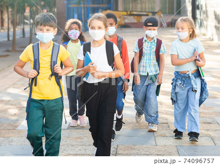 Children in masks going to school Children in masks going to school 74096757