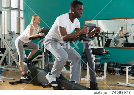 Couple training on stationary cycles Couple training on stationary cycles 74098978