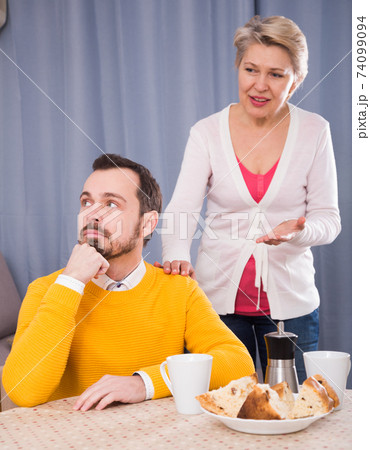 Mature mother and son quarrel 74099094