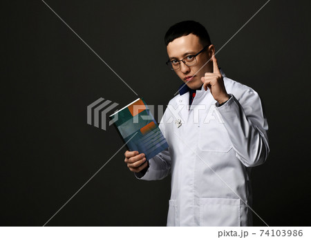 Young man doctors in white medical uniform gown 74103986