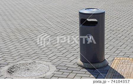 Street garbage container. Street garbage container. 74104357