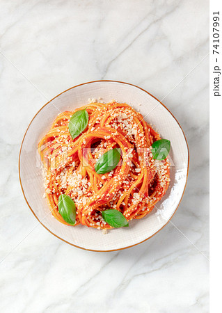 Italian pasta. Spaghetti with tomato sauce Italian pasta. Spaghetti with tomato sauce 74107991