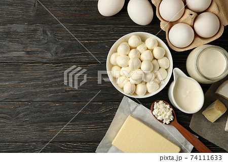 Different fresh dairy products on wooden background, space for text Different fresh dairy products on wooden background, space for text 74111633