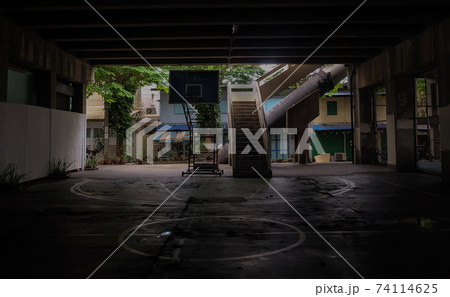 The community basketball court under the bridge. The community basketball court under the bridge. 74114625