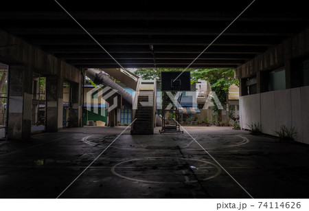 The community basketball court under the bridge. The community basketball court under the bridge. 74114626