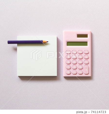 Memo paper, sticky notes and digital calculator with colored pencil on purple background. top view, copy space 74114723