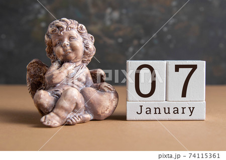 January 7 on the wooden calendar.The seventh day of the winter month, a calendar for the workplace. Winter January 7 on the wooden calendar.The seventh day of the winter month, a calendar for the workplace. Winter 74115361