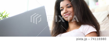 Happy attractive woman at home Happy attractive woman at home 74116980