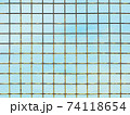 Metal lattice against light blue sky, illustration 74118654