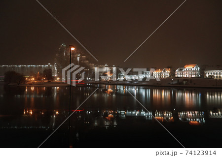 Panoramic view of Svisloch river with Trinity suburb in the evening in winter. Minsk. Belarus.  74123914