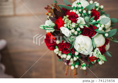 Wonderful luxury wedding bouquet of different flowers Wonderful luxury wedding bouquet of different flowers 74125656