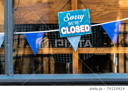 Sorry we are closed sign outside a restaurant during covid-19 lockdown 74128424