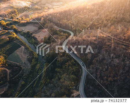 The road and trees in the evening from above,summer travel The road and trees in the evening from above,summer travel 74132377