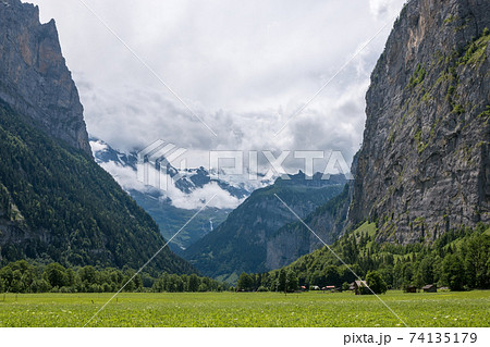 View valley of waterfalls in city Lauterbrunnen, Switzerland, Europe 74135179