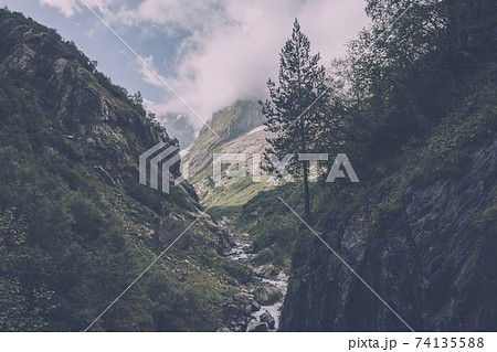 Closeup view mountains scenes in national park Dombai, Caucasus, Russia, Euro Closeup view mountains scenes in national park Dombai, Caucasus, Russia, Euro 74135588