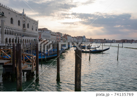 Panoramic view of Laguna Veneta coast of Venice city with gondolas Panoramic view of Laguna Veneta coast of Venice city with gondolas 74135769