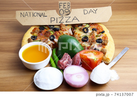 tasty pizza closeup with spice for pizza day 74137007