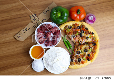 tasty pizza closeup with spice for pizza day 74137009