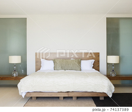 Modern double bed with bedside tables 74137389