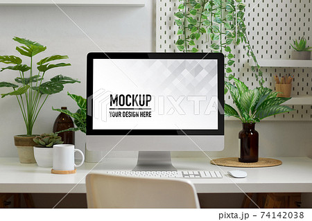 Biophilia workspace in home office room with computer, supplies and plants house Biophilia workspace in home office room with computer, supplies and plants house 74142038