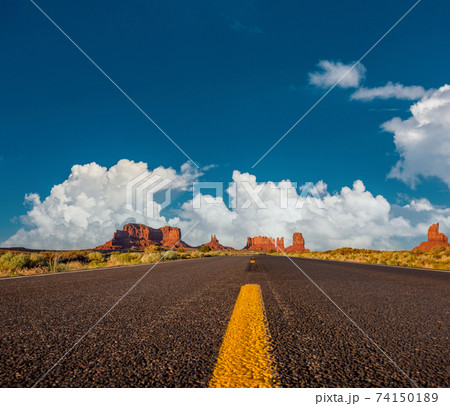 Empty scenic highway in Monument Valley 74150189