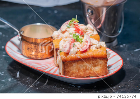 Lobster Roll.fresh Maine Lobster boiled, mixed with mayo, celery, chives served in toasted hero roll with crisp lettuce and drawn butter. Lobster Roll.fresh Maine Lobster boiled, mixed with mayo, celery, chives served in toasted hero roll with crisp lettuce and drawn butter. 74155774
