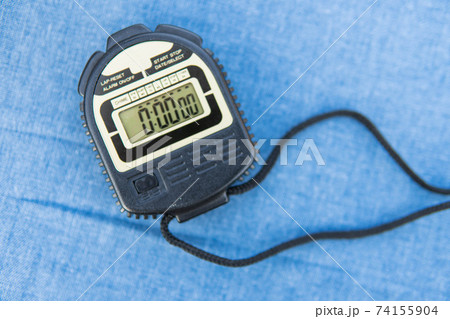 Stop watch on table. Stop watch on table. 74155904