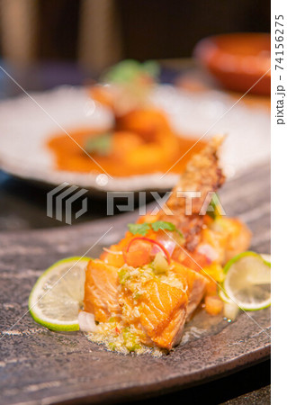 Fried salmon fillet with lemon and basil. Fried salmon fillet with lemon and basil. 74156275