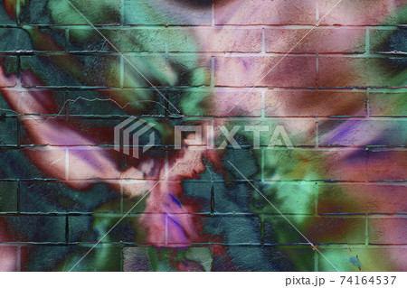 Brick wall. Abstract beautiful street art colorful graffiti style closeup. Iconic urban culture youth Brick wall. Abstract beautiful street art colorful graffiti style closeup. Iconic urban culture youth 74164537