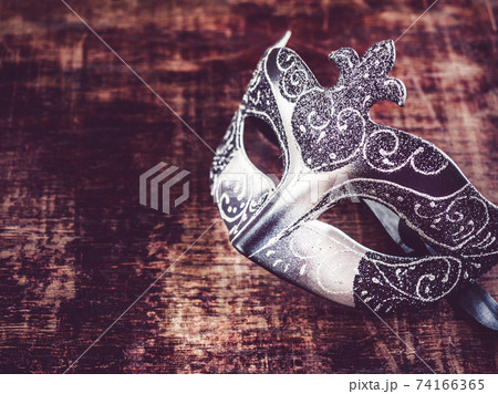 Vintage carnival mask. Preparing for the holidays Vintage carnival mask. Preparing for the holidays 74166365