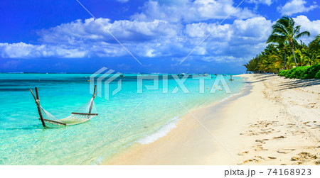 Tropical chilling out - hammock in turquoise water. Mauritius island 74168923