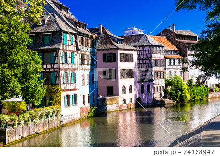Romantic canals of Strasbourg with traditional half-timbered houses. France. Alsace Romantic canals of Strasbourg with traditional half-timbered houses. France. Alsace 74168947