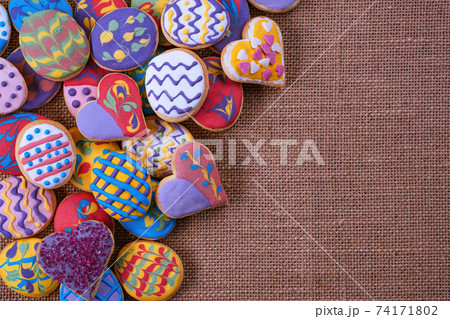 Homemade, freshly baked and decorated, colorful Easter cookies. 74171802