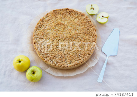 Freshly baked homemade double crutsed apple crumb pie. 74187411