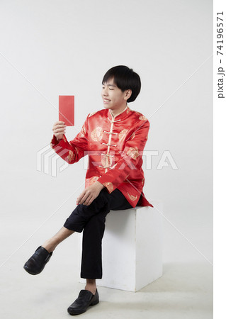 Young Asian man with red packet money Young Asian man with red packet money 74196571