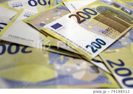 Euro bills of 200 are on the table. Euro bills of 200 are on the table. 74198312
