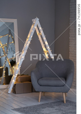 Details of a Scandinavian cozy interior in warm light beige. Details of a Scandinavian cozy interior in warm light beige. 74198956