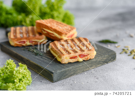 Delicious fresh toast grill with cheese and ham Delicious fresh toast grill with cheese and ham 74205721