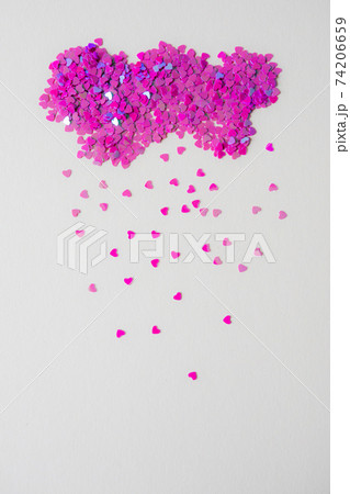 Pink small hearts on the background, like rain Pink small hearts on the background, like rain 74206659