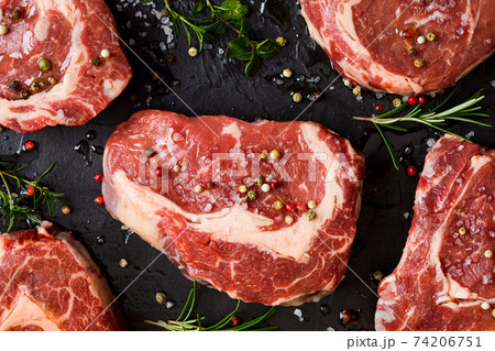 Variety of tastes and flavours on raw meat 74206751