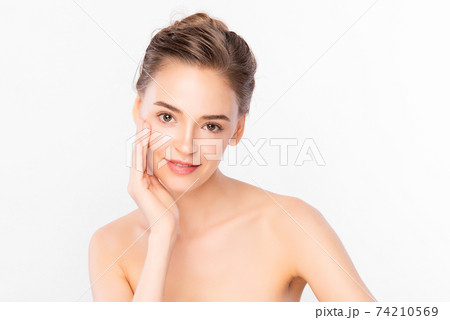 Beautiful young woman with clean fresh skin on white background, Face care, Facial treatment Beautiful young woman with clean fresh skin on white background, Face care, Facial treatment 74210569