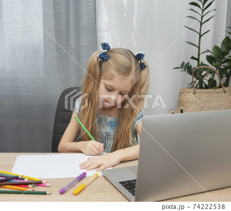 Cute girl doing homework 74222538