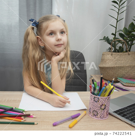 Cute girl doing homework Cute girl doing homework 74222541