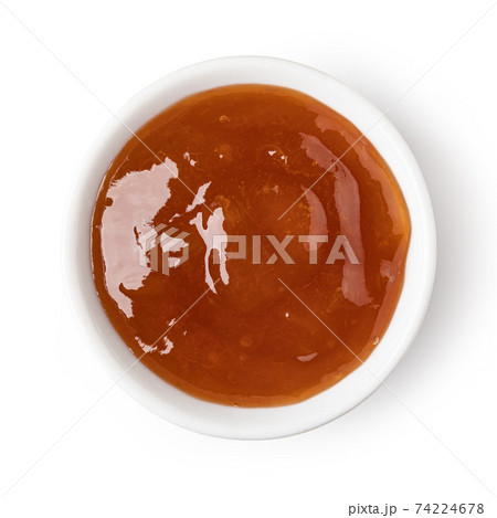 glass bowl of apricot jam glass bowl of apricot jam 74224678