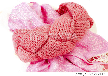 Beautiful pink headband, knitted from threads. Studio Photo Beautiful pink headband, knitted from threads. Studio Photo 74227117