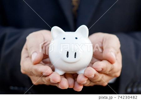Saving money with pig piggy bank 74230482