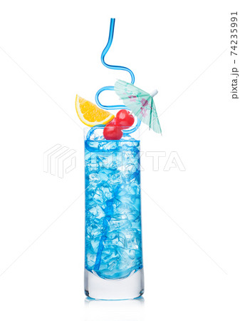 Blue lagoon cocktail highball glass with straw and orange slice with sweet cherry and umbrella  74235991