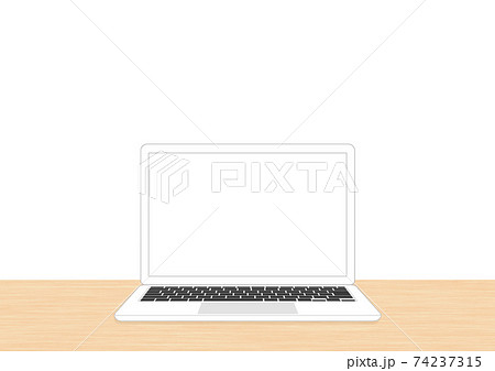 木目調机に置いたシンプルなノートパソコン　白系黒キー 74237315