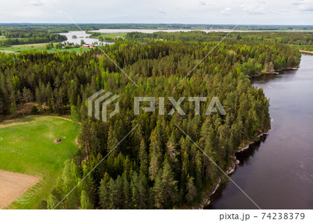 Aerial panoramic view of rapid Susikoski at river Kymijoki, Finland. Aerial panoramic view of rapid Susikoski at river Kymijoki, Finland. 74238379