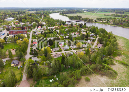 Aerial panoramic view of city Inkeroinen at river Kymijoki, Finland. Aerial panoramic view of city Inkeroinen at river Kymijoki, Finland. 74238380